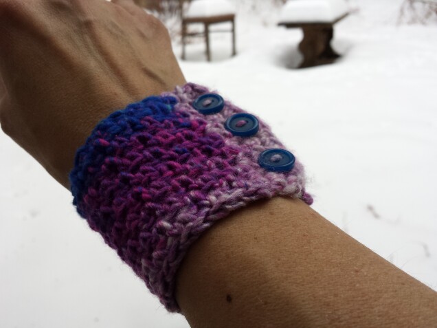 Detailed image 3 of pine forest wrist warmer in magenta