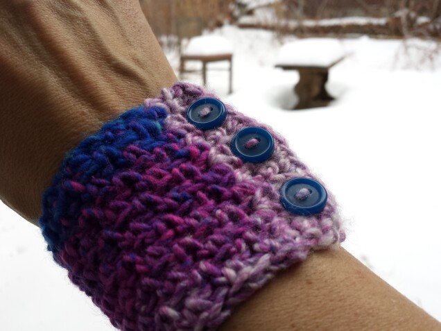 Detailed image 1 of pine forest wrist warmer in magenta