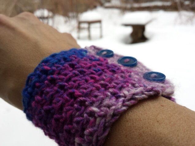 Detailed image 2 of pine forest wrist warmer in magenta