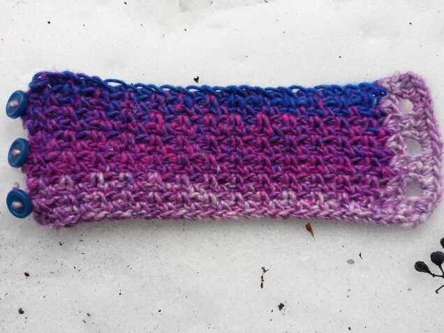 Detailed image 4 of pine forest wrist warmer in magenta