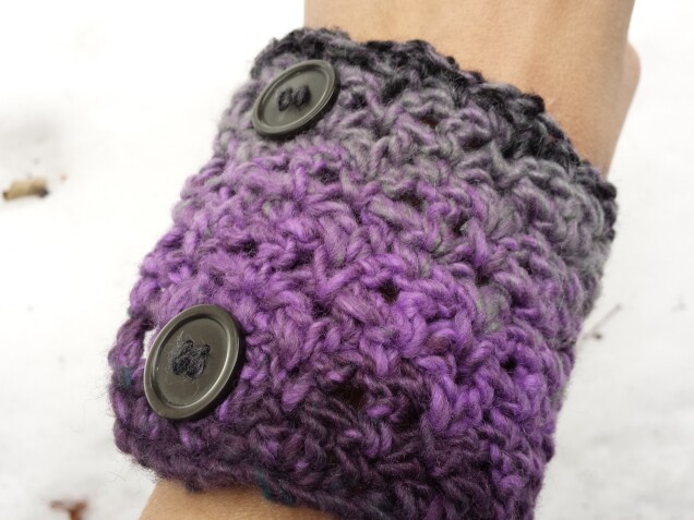 Detailed image 2 of pine forest wrist warmer in purple