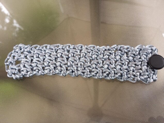 Detailed image 2 of metallic satin cord gray cuff bracelet