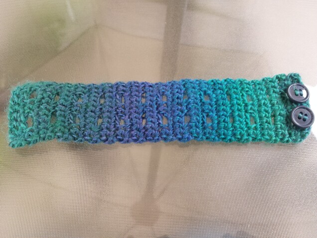 Detailed image 2 of purple blue green cuff bracelet