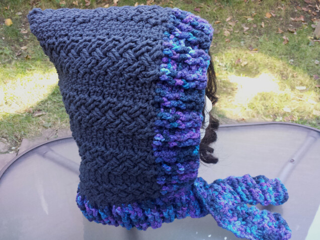 Detailed image 4 of braided cables hood with scarf