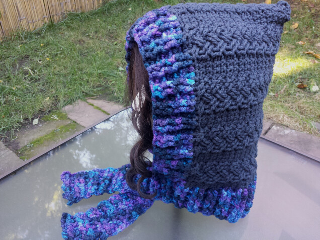 Detailed image 3 of braided cables hood with scarf