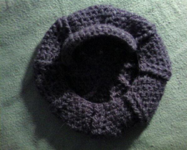 Detailed image 2 of brown spiral tam hat with visor