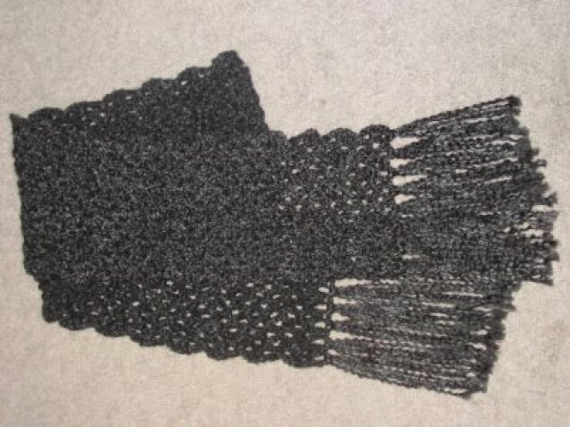 Detailed image 1 of dark gray scarf