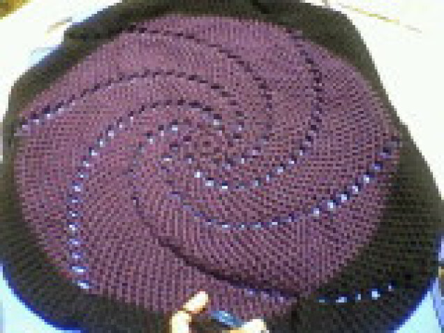 Detailed image 1 of purple & black spiral blanket