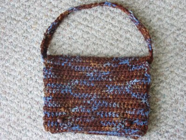 Detailed image 1 of brown & blue variegated messenger bag